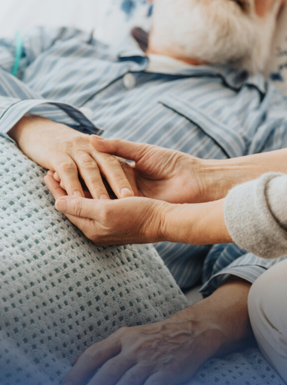 Pielęgniarka z obłożnie chorą pacjentką